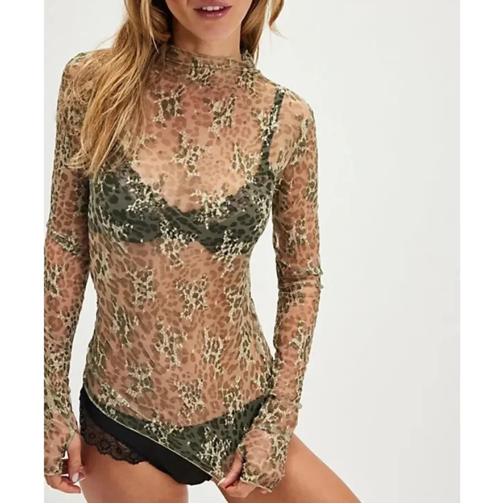 NWOT Lady Lux printed top by Intimately Free People in size Small